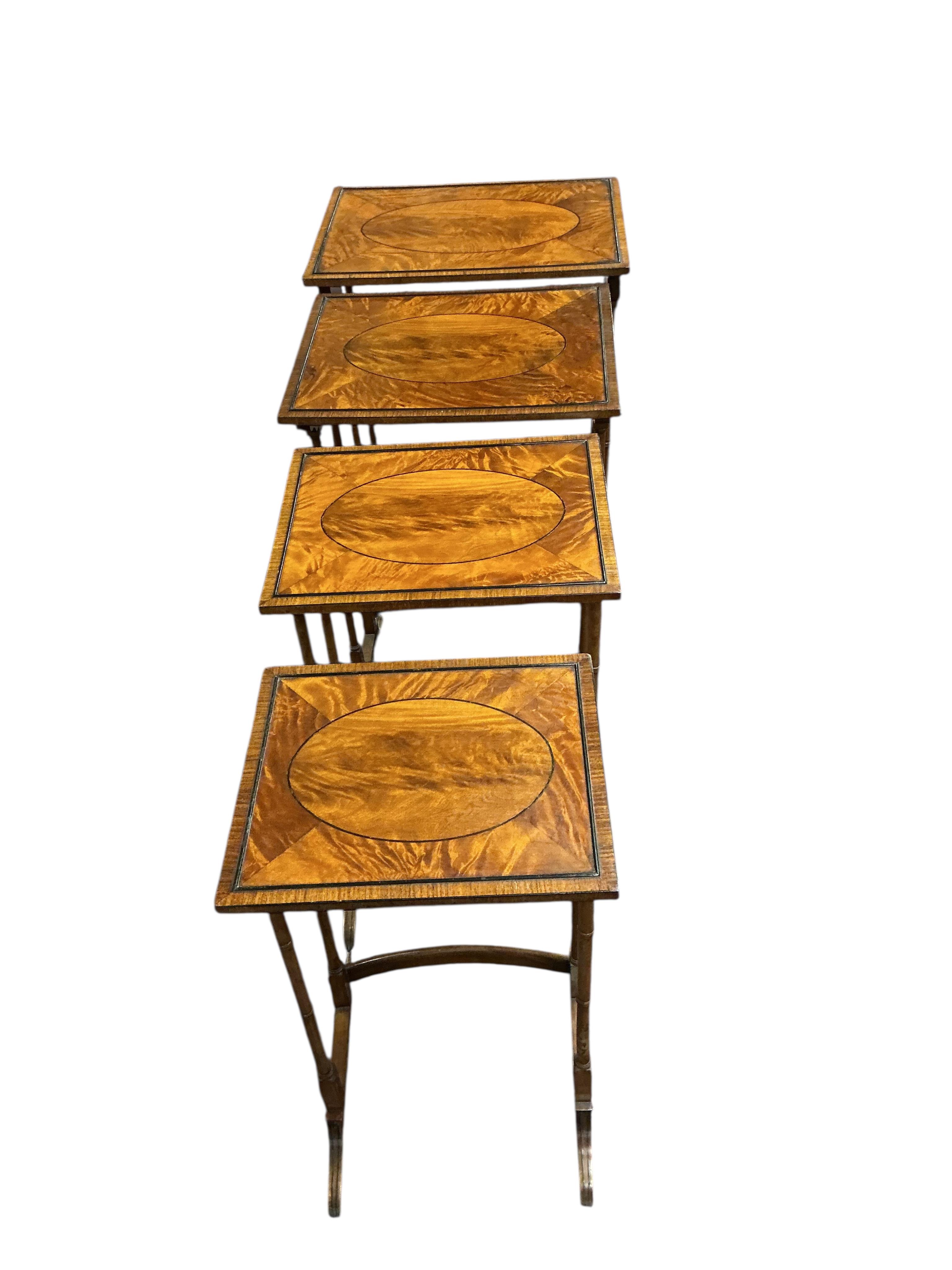 A quartetto of rectangular satinwood tables, width 49cm, depth 35cm, height 69cm